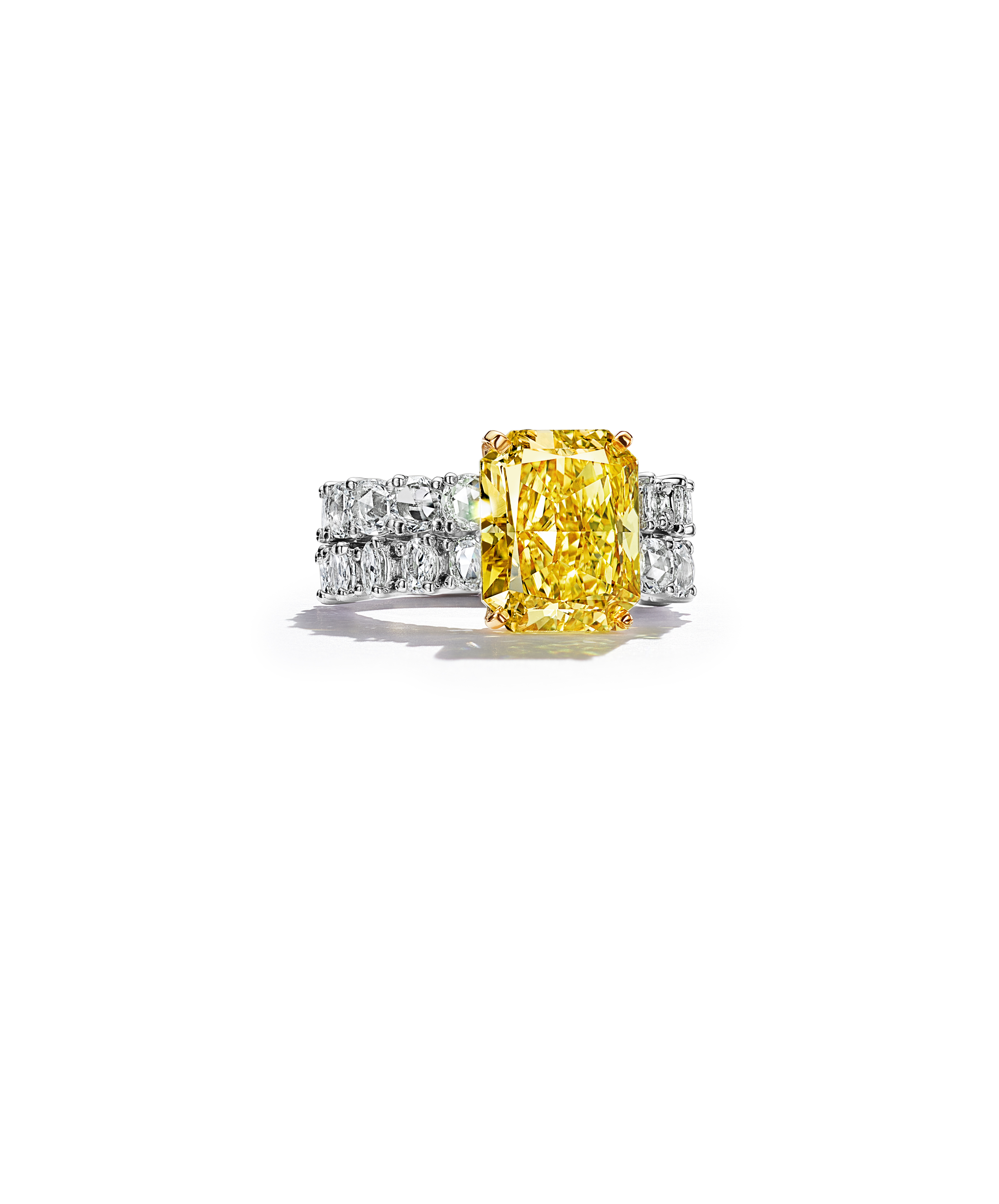 Ring in platinum and 18k yellow gold with a fancy vivid yellow 