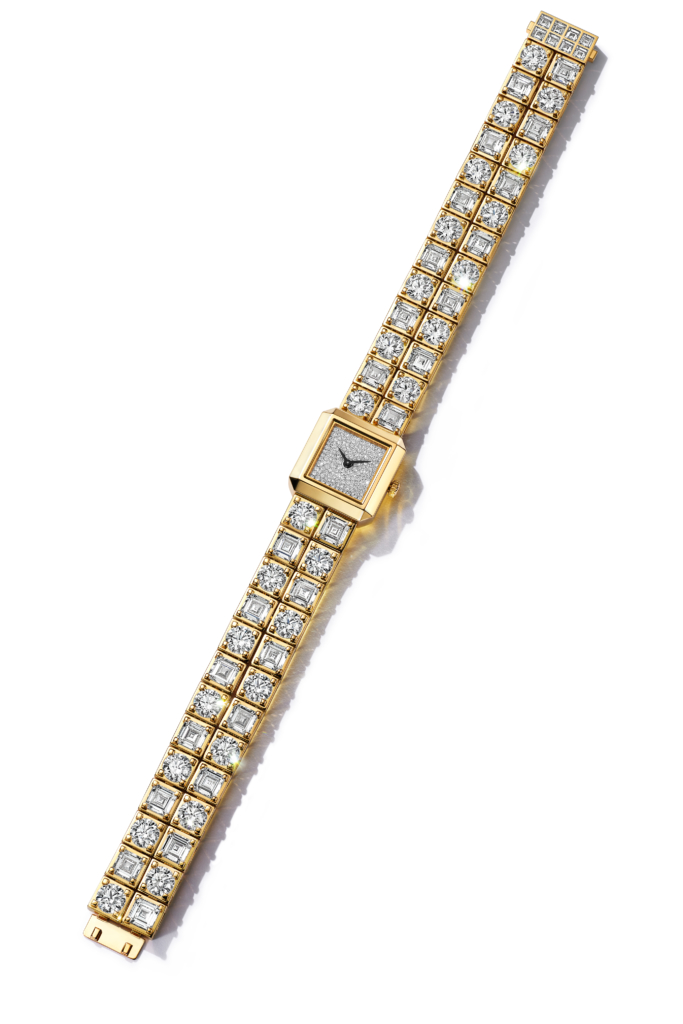 Watch in 18k yellow gold with diamonds. Quartz movement. Swiss made. Tiffany