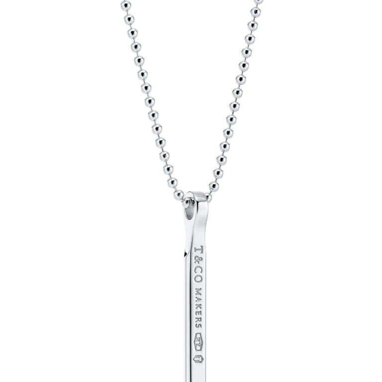 Silver Tone Necklace with A Bar Pendant Stamped with The Coo (121504)